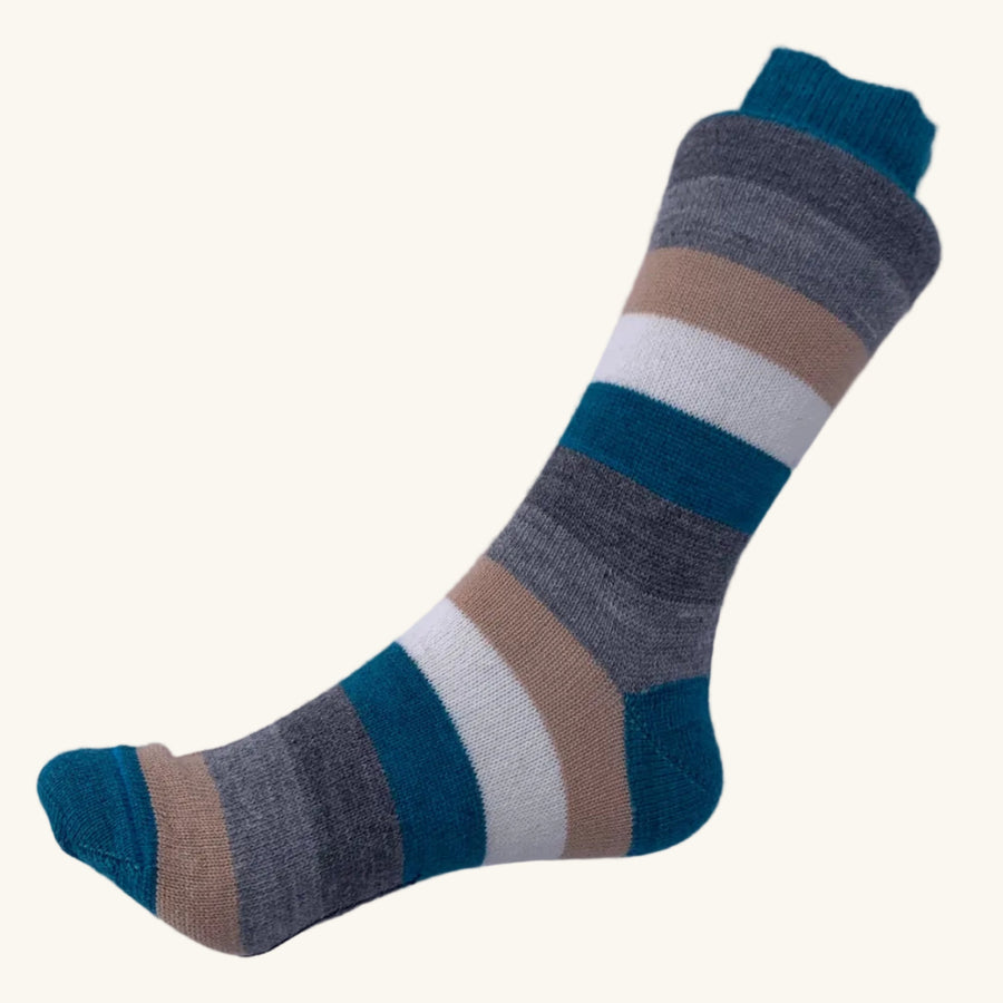Striped sock with teal, brown, and white colors on a white background