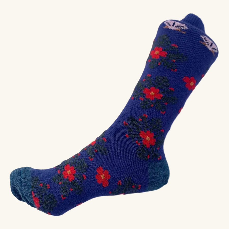 Blue sock with red floral pattern on a white background