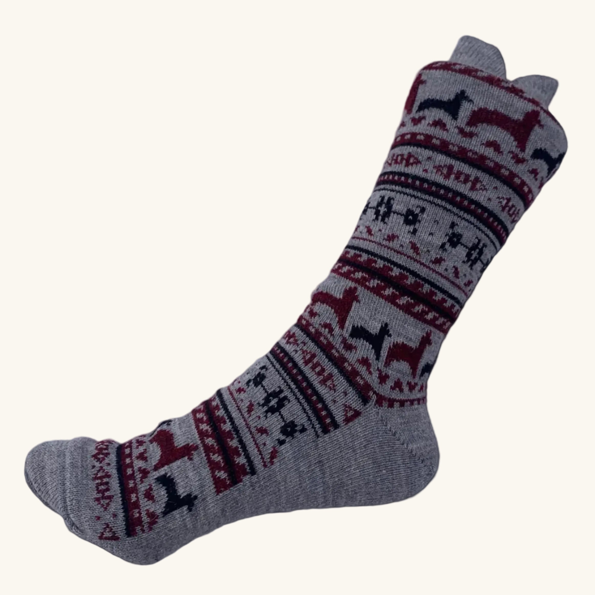 Gray sock with red and black patterns on a white background