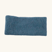 Light blue headband on a white background
