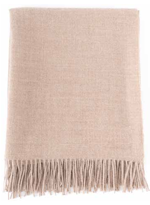 A folded woven throw in a warm sandy beige color with fringe along the bottom edge, shown on a white background.