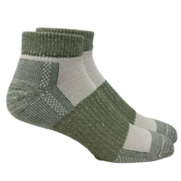 Pair of green and gray socks on a white background